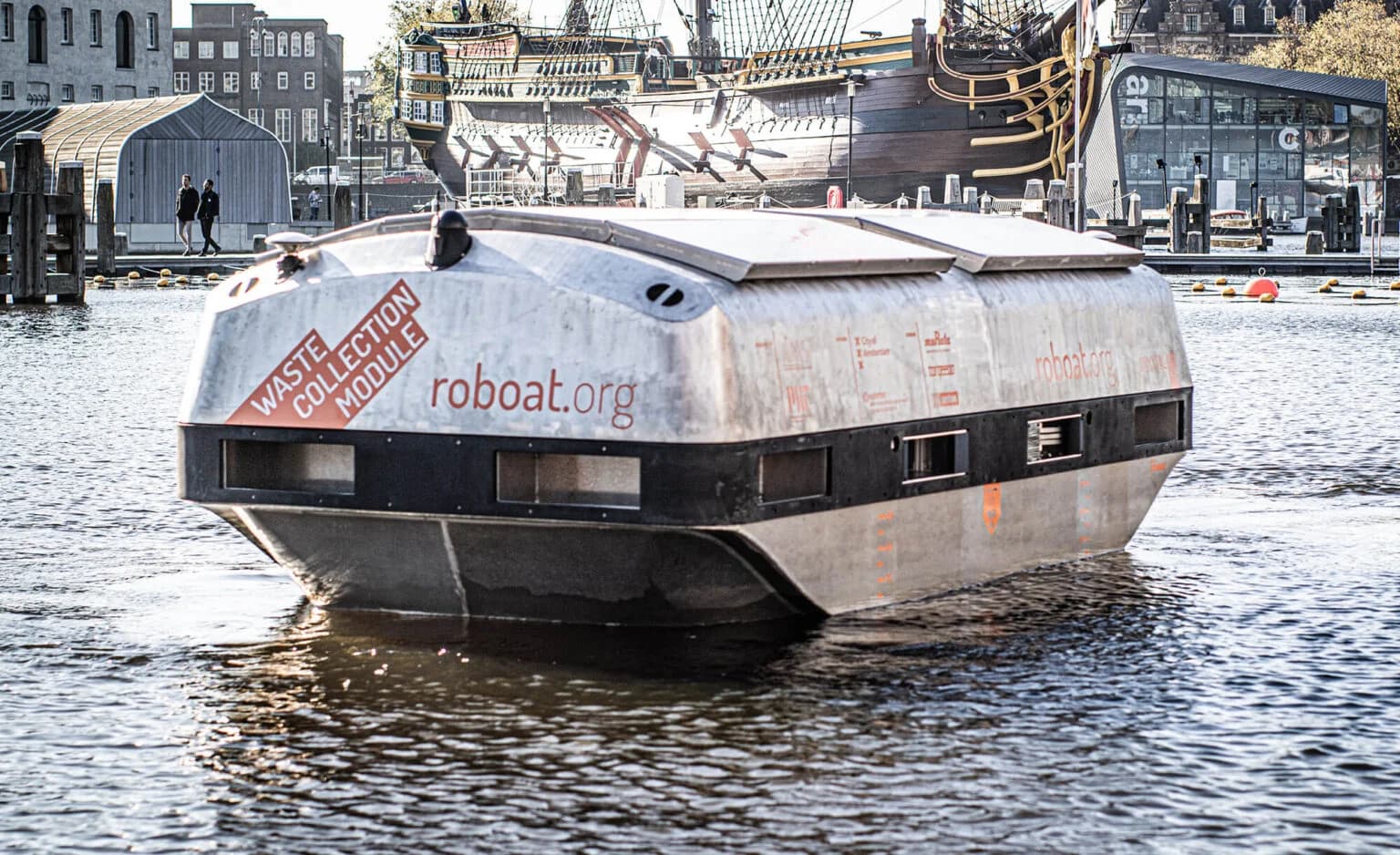 The autonomous waste-collection container vessel on an Amsterdam canal.
